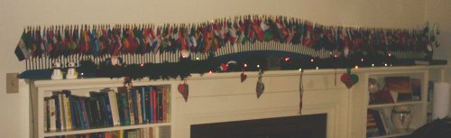 Our UN flag set decorating the holiday mantle.